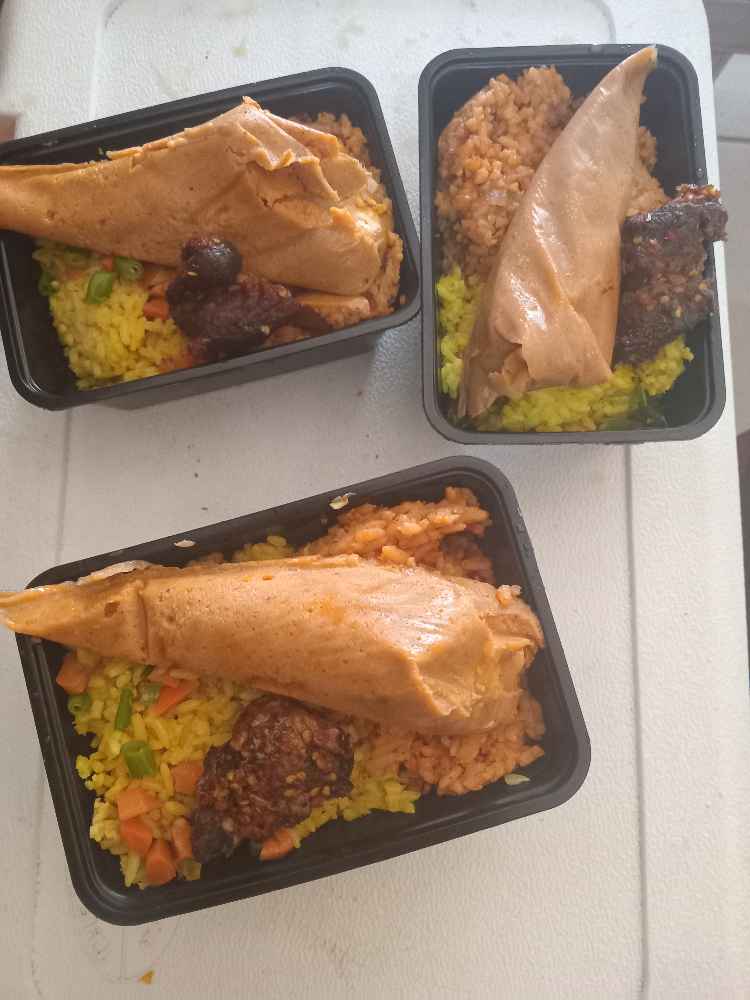 Jollof Rice,fried Rice with moimoi and pepper beef image - Mobi Foods