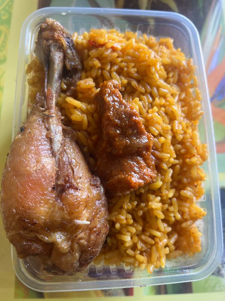 Jollof rice, meat and chicken image - Mobi Foods